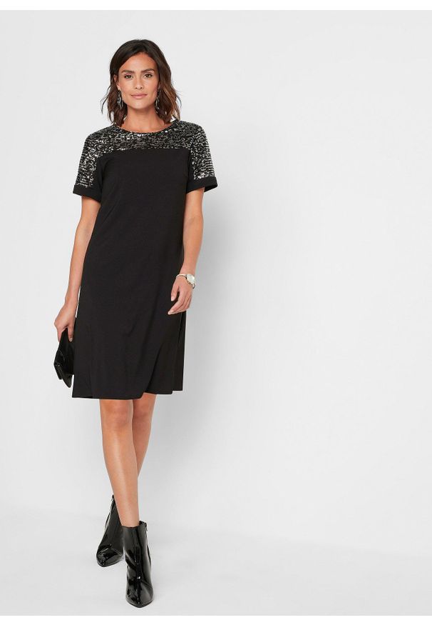bonprix - Sukienka z wstawką z cekinami. Kolor: czarny