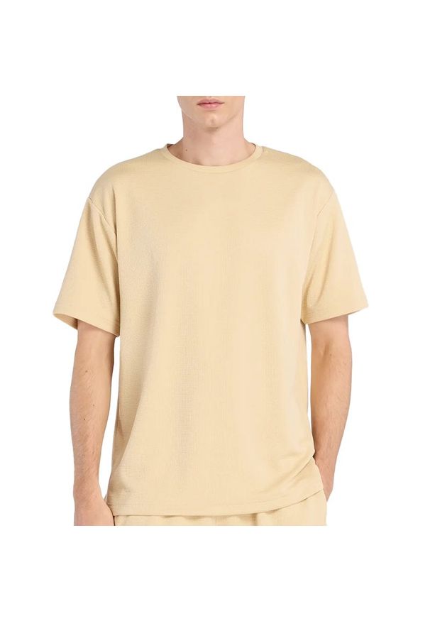 Koszulka męska New Balance MT6100FRABC - żółta. Kolor: żółty. Materiał: materiał, poliester. Długość rękawa: krótki rękaw. Długość: krótkie