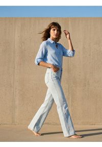 Sinsay - Jeansy flare z efektem sprania - niebieski. Kolor: niebieski #1