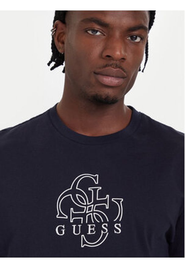 Guess T-Shirt M5BI76 I3Z14 Niebieski Relaxed Fit. Kolor: niebieski. Materiał: bawełna