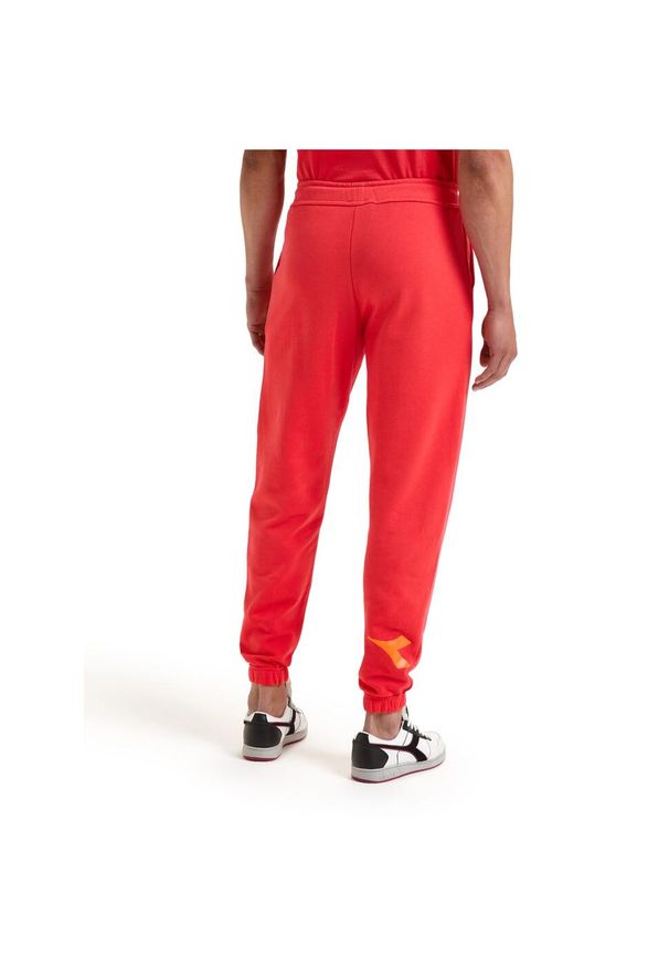 Diadora - Spodnie dresowe DIADORA PANT MANIFESTO. Kolor: czerwony. Materiał: dresówka