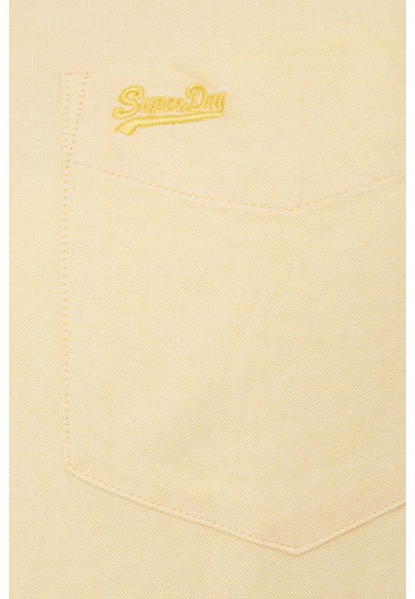 Superdry koszula bawełniana męska kolor żółty regular z kołnierzykiem button-down. Typ kołnierza: button down. Kolor: żółty. Materiał: bawełna. Długość rękawa: krótki rękaw. Długość: krótkie