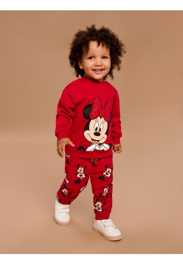Sinsay - Spodnie dresowe Minnie Mouse - czerwony. Kolor: czerwony. Materiał: dresówka. Wzór: motyw z bajki