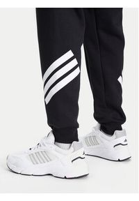 Adidas - adidas Spodnie dresowe Future Icons 3-Stripes JD4863 Czarny Regular Fit. Kolor: czarny. Materiał: bawełna