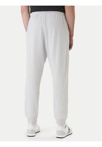 TOMMY HILFIGER - Tommy Hilfiger Spodnie dresowe UM0UM03664 Szary Regular Fit. Kolor: szary. Materiał: bawełna #4