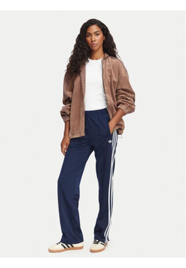 Adidas - adidas Spodnie dresowe Firebird Classic KS4795 Granatowy Regular Fit. Kolor: niebieski. Materiał: syntetyk