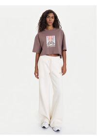 New Balance T-Shirt WT53904 Brązowy Regular Fit. Kolor: brązowy. Materiał: bawełna #3