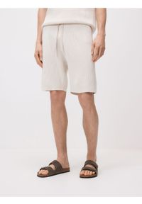 Reserved - Dzianinowe szorty z bawełny - beżowy. Kolor: beżowy. Materiał: bawełna, dzianina #1