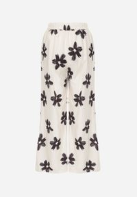 Born2be - Czarno-Kremowe Spodnie o Szerokim Kroju z Wysokim Stanem w Kwiaty Ozdobione Wiązaniem Neatea. Okazja: do pracy, na co dzień. Stan: podwyższony. Kolor: beżowy. Wzór: aplikacja, kwiaty. Styl: casual #8