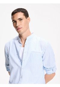Reserved - Koszula slim fit z lnem - jasnoniebieski. Kolor: niebieski. Materiał: len