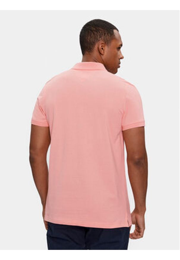 Tommy Jeans Polo DM0DM18312 Różowy Slim Fit. Typ kołnierza: polo. Kolor: różowy. Materiał: bawełna