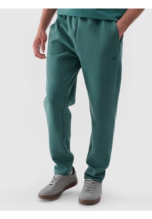 4f - 4F Spodnie dresowe męskie - zielone XL. Kolor: zielony. Materiał: dresówka. Wzór: gładki, ze splotem. Sport: fitness