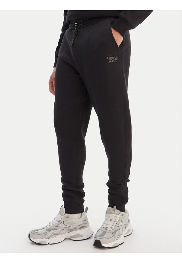 Reebok Spodnie dresowe Azaz RK25549CCM Czarny Slim Fit. Kolor: czarny. Materiał: syntetyk, bawełna