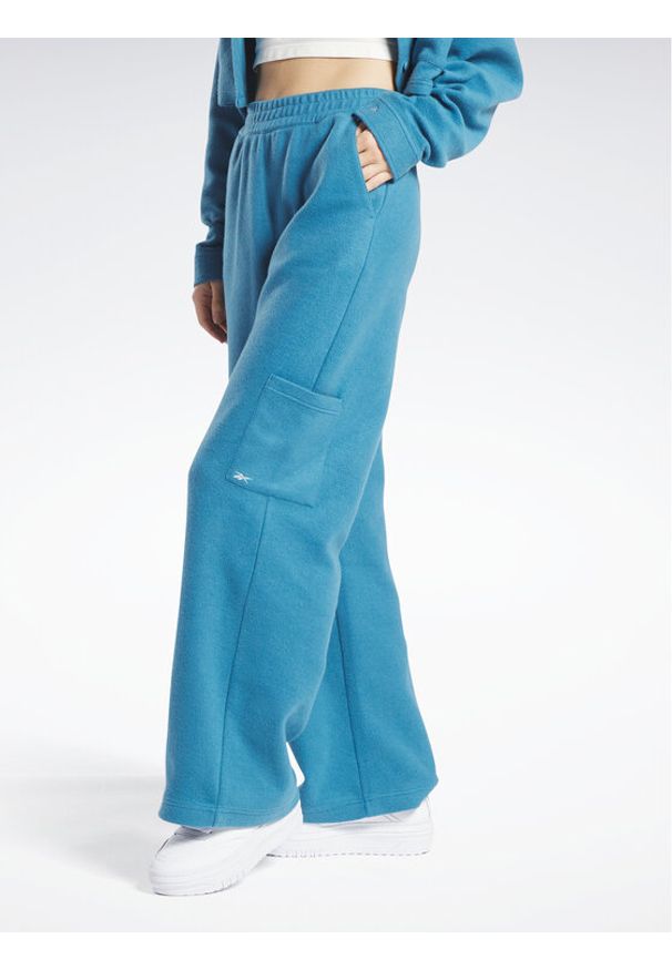 Reebok Spodnie dresowe Reebok Classics Reverse Fleece Wide Leg Joggers HS0385 Niebieski. Kolor: niebieski. Materiał: bawełna, dresówka