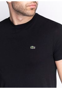 Koszulka męska Lacoste T-Shirt (TH6709-031). Typ kołnierza: polo. Kolor: czarny. Materiał: dzianina. Długość: krótkie. Sezon: lato. Sport: bieganie #5