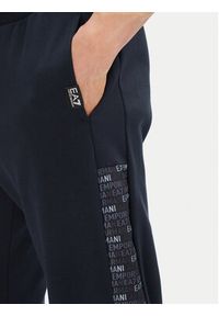 EA7 Emporio Armani Spodnie dresowe 7M000216 AF12660 UB102 Granatowy Regular Fit. Kolor: niebieski. Materiał: bawełna, syntetyk