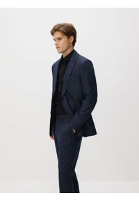 Reserved - Spodnie garniturowe slim fit - granatowy. Kolor: niebieski. Materiał: tkanina #1