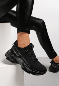 Renee - Czarne Sneakersy Pherinna. Wysokość cholewki: przed kostkę. Kolor: czarny. Materiał: guma, materiał. Szerokość cholewki: normalna. Obcas: na platformie