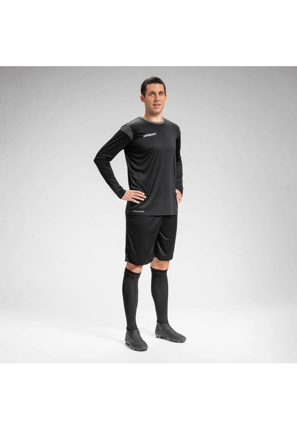 UHLSPORT - Dziecięcy dżersej z długim rękawem Uhlsport Squad 27. Kolor: wielokolorowy, czarny, szary, brązowy. Materiał: jersey. Długość rękawa: długi rękaw. Długość: długie
