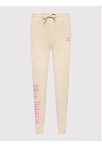 New Balance Spodnie dresowe WP21508 Beżowy Regular Fit. Kolor: beżowy. Materiał: dresówka, syntetyk