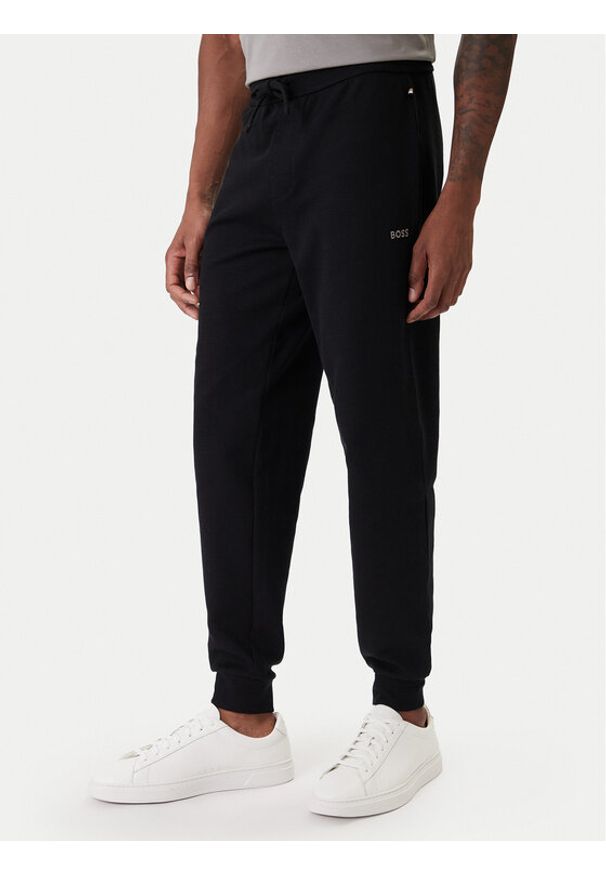 BOSS Spodnie dresowe Waffle 50535878 Czarny Regular Fit. Kolor: czarny. Materiał: syntetyk, bawełna