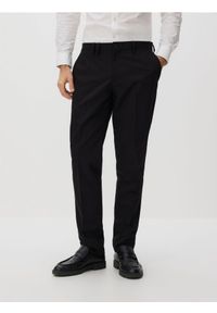 Reserved - Spodnie garniturowe slim fit - czarny. Kolor: czarny. Materiał: wiskoza, tkanina #1
