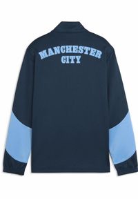 Puma - Młodzieżowa kurtka Manchester City ftblNRGY+ PUMA Marine Blue Blazing. Kolor: niebieski. Wzór: aplikacja