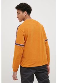 New Balance bluza MT13513MOE męska kolor pomarańczowy z aplikacją. Kolor: pomarańczowy. Materiał: dzianina. Wzór: aplikacja