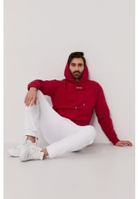 Calvin Klein Jeans - Bluza bawełniana. Okazja: na co dzień. Typ kołnierza: kaptur. Kolor: różowy. Materiał: bawełna. Wzór: gładki. Styl: casual #1