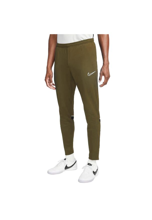 Spodnie sportowe męskie Nike Dri-FIT Academy Pants. Kolor: zielony. Materiał: poliester. Technologia: Dri-Fit (Nike)