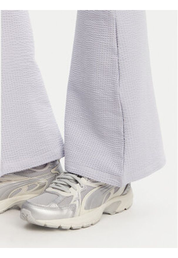 Puma Legginsy Dare To 629809 Fioletowy Slim Fit. Kolor: fioletowy. Materiał: bawełna
