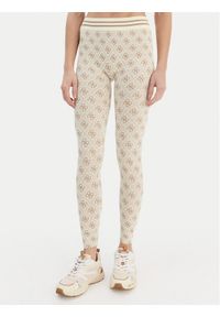 Guess Spodnie materiałowe 179838 Beżowy Slim Fit. Kolor: beżowy. Materiał: syntetyk #1