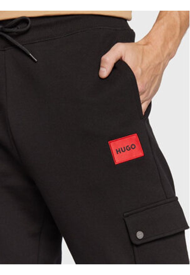 Hugo Spodnie dresowe Dwellrom 50479164 Czarny Relaxed Fit. Kolor: czarny. Materiał: bawełna