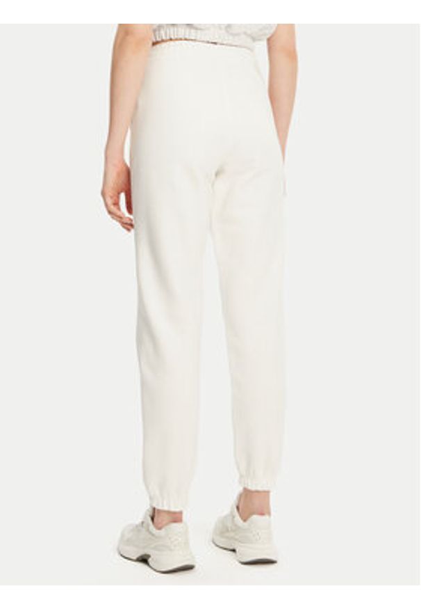 Tommy Jeans Spodnie dresowe Badge DW0DW20679 Écru Regular Fit. Materiał: bawełna