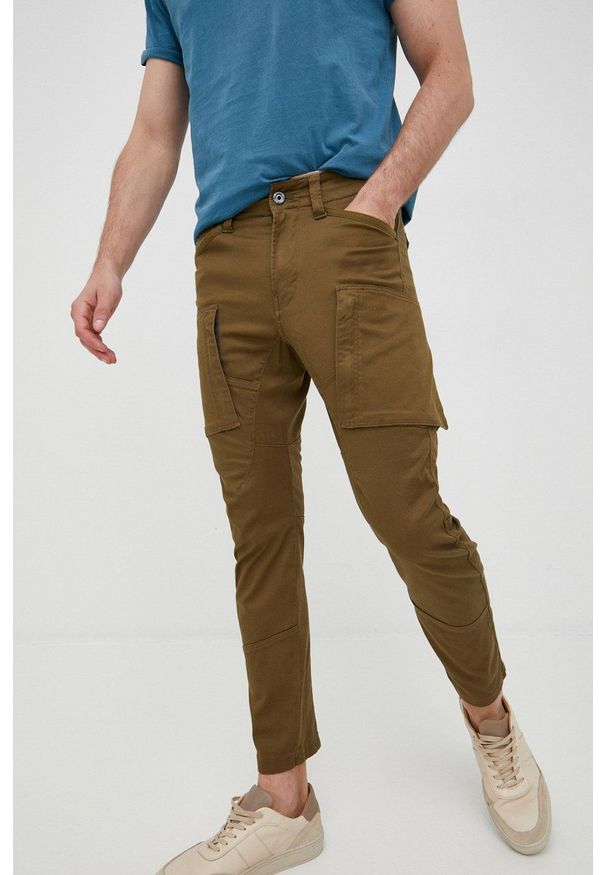 G-Star RAW - G-Star Raw Spodnie D18928.C105 męskie kolor zielony dopasowane. Kolor: zielony. Materiał: tkanina, bawełna, poliester