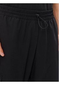 Adidas - adidas Spodnie dresowe City Escape IR5179 Czarny Regular Fit. Kolor: czarny. Materiał: syntetyk #5