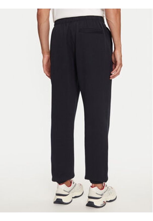 TOMMY HILFIGER - Tommy Hilfiger Spodnie dresowe Essential MW0MW37231 Granatowy Relaxed Fit. Kolor: niebieski. Materiał: syntetyk, bawełna