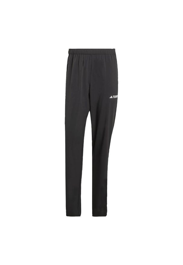 Adidas - Spodnie Multi Essentials Stretch. Kolor: czarny. Materiał: materiał