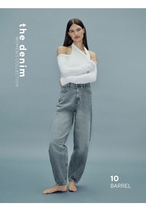 Reserved - Jeansy barrel leg - niebieski. Kolor: niebieski