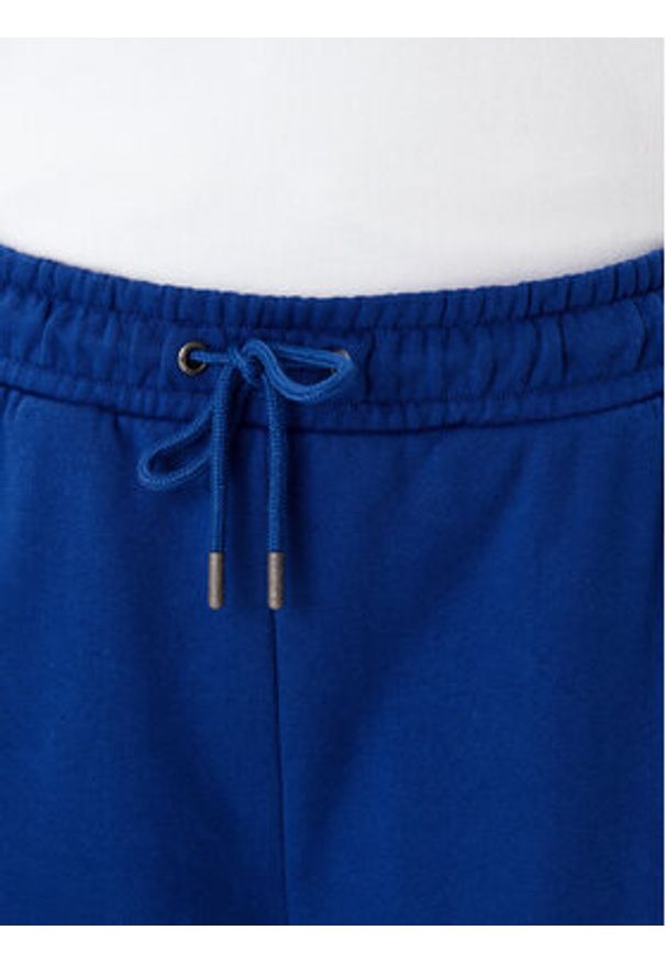 Guess Jeans Spodnie dresowe W5YB32 K68I4 Niebieski Regular Fit. Kolor: niebieski. Materiał: bawełna