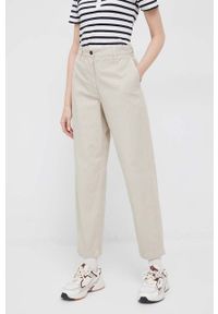 TOMMY HILFIGER - Tommy Hilfiger spodnie bawełniane kolor beżowy proste high waist. Stan: podwyższony. Kolor: beżowy. Materiał: bawełna