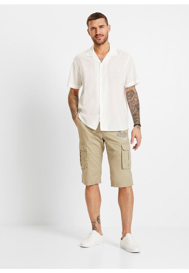 bonprix - Długie bermudy Regular Fit. Kolor: zielony. Długość: długie. Wzór: nadruk