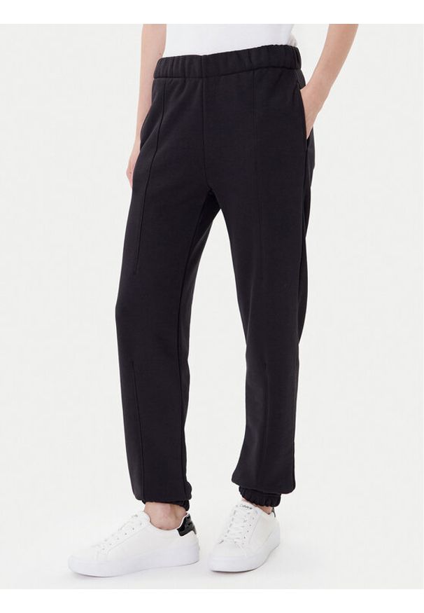 On Spodnie dresowe Club Pants 1WE1005 Czarny Relaxed Fit. Kolor: czarny. Materiał: bawełna