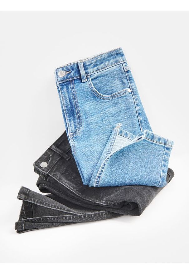 Reserved - Jeansy slim fit z rozcięciem - niebieski. Kolor: niebieski