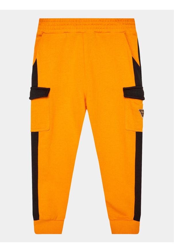 Guess Spodnie dresowe N3YQ12 KA6R3 Pomarańczowy Regular Fit. Kolor: pomarańczowy. Materiał: bawełna
