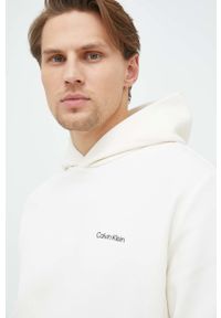 Calvin Klein bluza męska kolor beżowy z kapturem gładka. Typ kołnierza: kaptur. Kolor: beżowy. Materiał: dzianina. Wzór: gładki #2