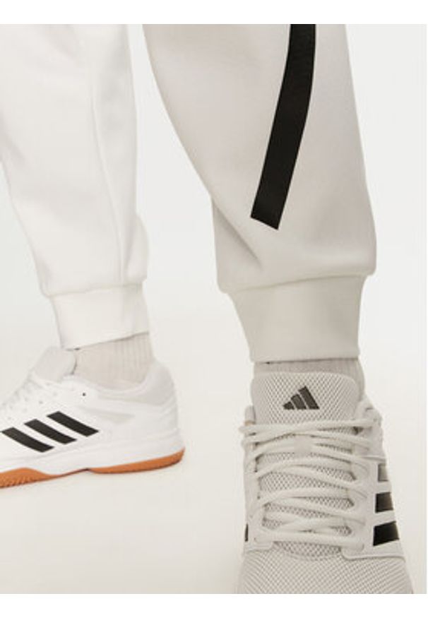 Adidas - adidas Spodnie dresowe Z.N.E. JF2449 Biały Regular Fit. Kolor: biały. Materiał: bawełna