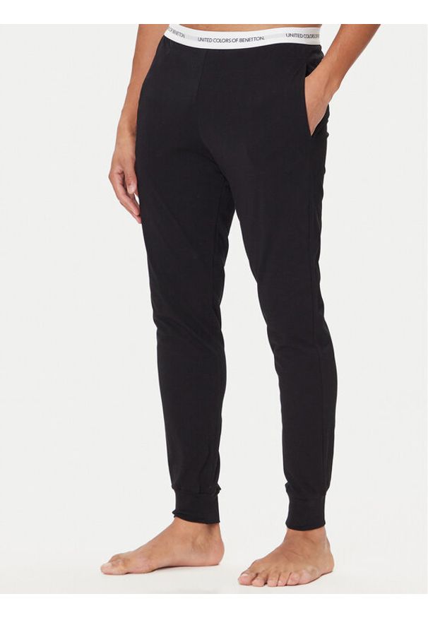 United Colors of Benetton - United Colors Of Benetton Spodnie piżamowe 30964F00V Czarny Regular Fit. Kolor: czarny. Materiał: bawełna