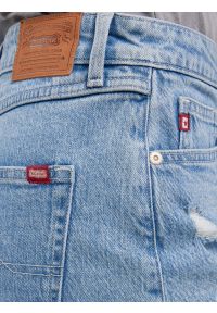 Big-Star - Szorty damskie jeansowe z surowym wykoŅczeniem z kolekcji Authentic niebieskie Authentic Girl 284. Okazja: na co dzień. Stan: podwyższony. Kolor: niebieski. Materiał: jeans. Sezon: lato. Styl: klasyczny, casual, elegancki