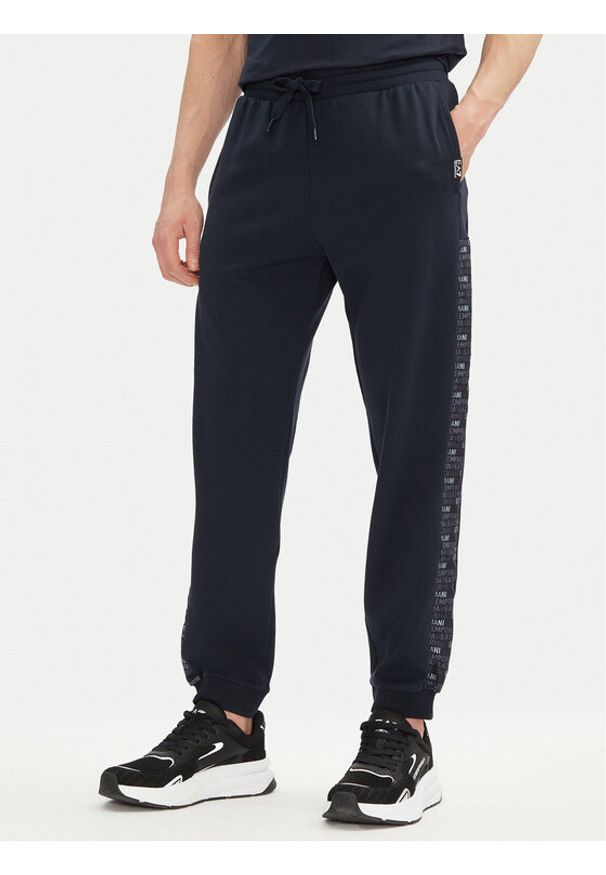 EA7 Emporio Armani Spodnie dresowe 7M000216 AF12660 UB102 Granatowy Regular Fit. Kolor: niebieski. Materiał: bawełna, syntetyk